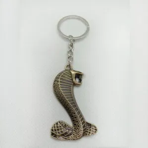 cobra gold platted copper keychain
